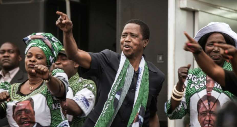 Edward Lungu (C) was narrowly reelected as Zambias president with 50.35 percent of the vote.  By Gianluigi Guercia (AFP/File)