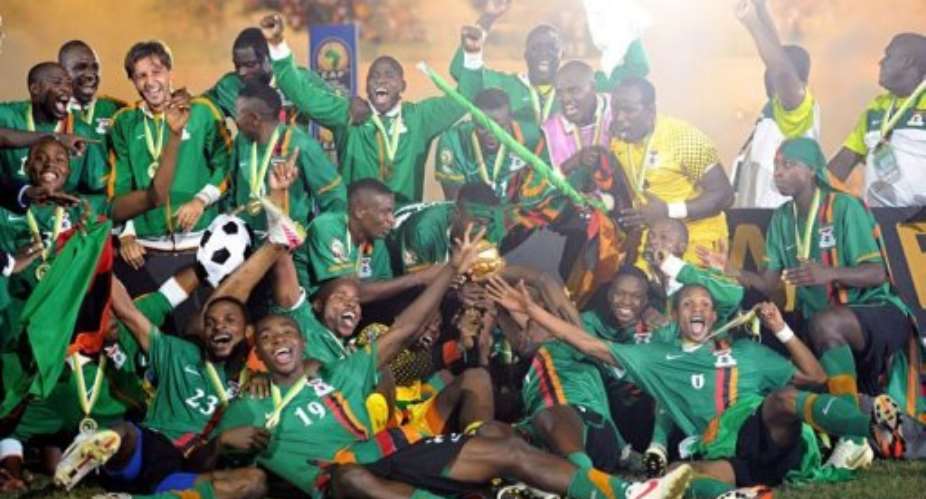Zambia national team players celebrate their victory.  By Franck Fife AFP