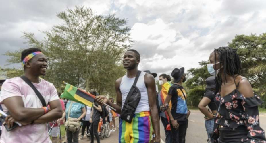 Zambian refugee activist Anold Mulaisho C marched at Pretoria Pride, an event underlining how South Africa has some of the world's most progressive LGBTQ+ laws.  By GUILLEM SARTORIO AFP