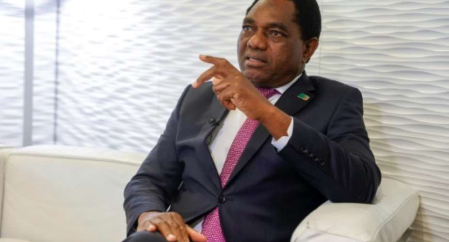 Zambia's debt is 'like a python around our necks, ribs and legs', Hichilema said.  By Geoffroy VAN DER HASSELT AFP