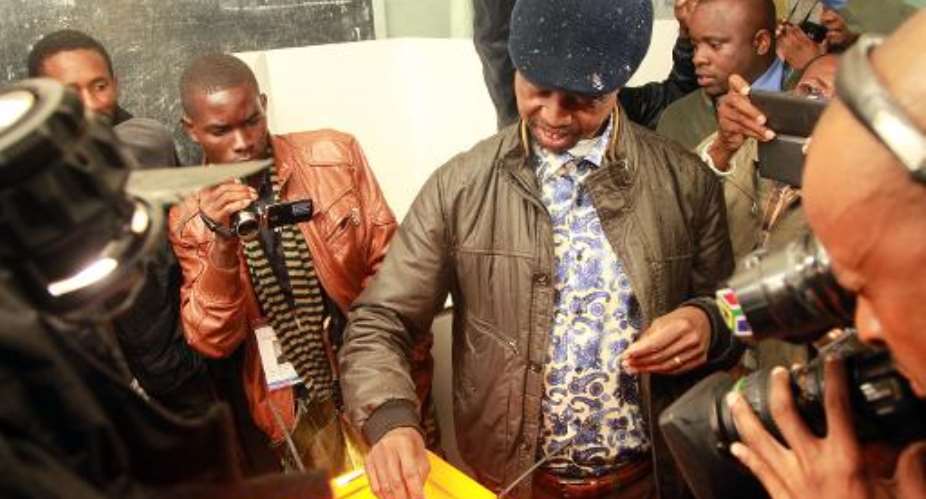 Patriotic Front presidential candidate Edgar Lungu votes in Lusaka on January 20, 2015 in Lusaka.  By Salim Dawood AFPFile