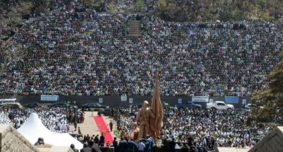 Thousands of mourners gather at the National Heroes Acre for the burial of Solomon Mujuru in 2011.  By Jekesai Njikizana AFPFile