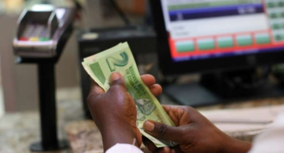 Zimbabwe in 2016 began issuing bond notes, a parallel currency meant to be equivalent to the US dollar, when there was a shortage of cash circulating in the country.  By Wilfred Kajese AFPFile