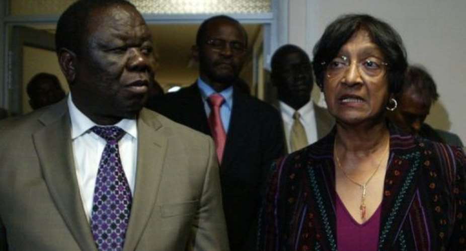 UN High Commissioner for Human Rights Navi Pillay (R) speaks to the press with Zimbabwe Prime Minister Morgan Tsvangirai.  By Jekesai Njikizana (AFP)