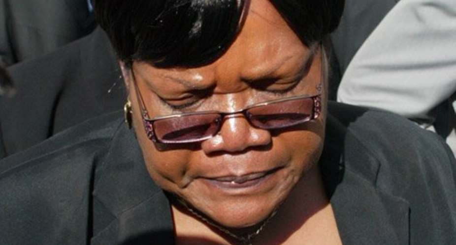 Zimbabwe Vice President Joice Mujuru has questioned the official account of her husbands death.  By Jekesai Njikizana (AFP)