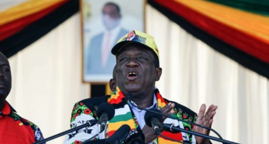 Zimbabwe President Emmerson Mnangagwa, pictured in June 2018, said the space agency would use technology such as satellites to improve farming, mineral explanation and other activities.  By ZINYANGE AUNTONY AFPFile