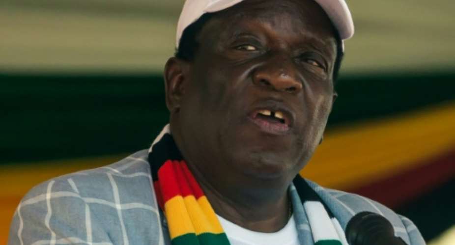 Zimbabwe President Emmerson Mnangagwa, seen here, has so far failed to redress the hyperinflation caused by economic mismanagement under his predecessor Robert Mugabe.  By Jekesai NJIKIZANA AFP