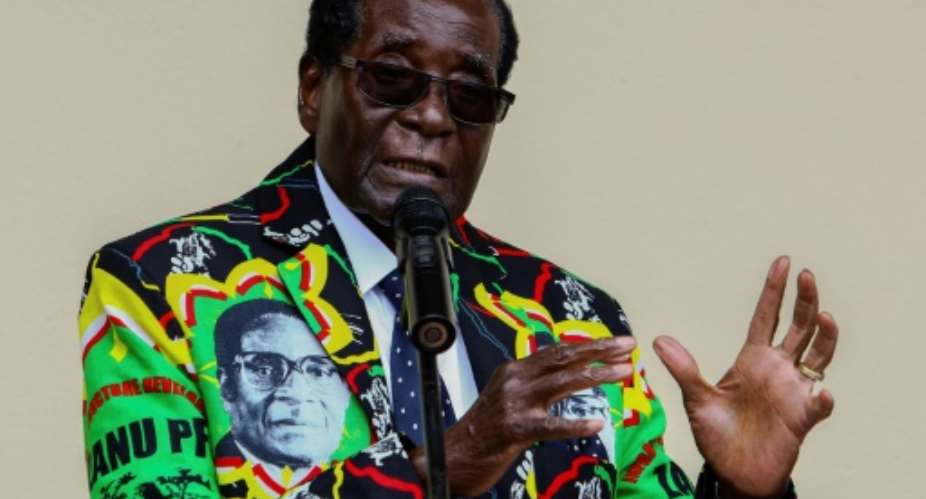 Zimbabwe President Robert Mugabe speaks at the party's annual conference on December 17, 2016.  By Jekesai NJIKIZANA AFPFile