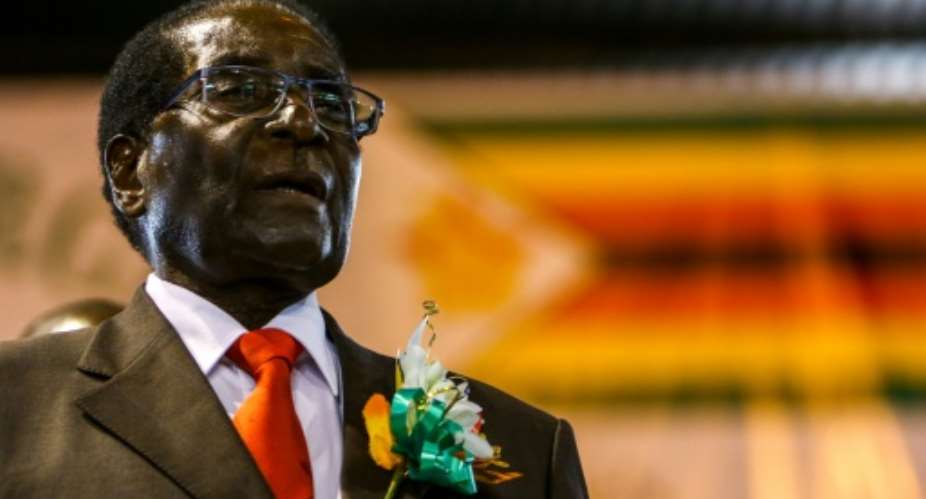 Zimbabwe President Robert Mugabe, the former political prisoner turned guerrilla leader, swept to power in 1980.  By JEKESAI NJIKIZANA AFPFile
