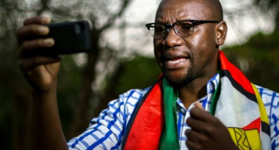 Zimbabwean cleric Evan Mawarire has spearheaded the popular ThisFlag protest campaign.  By Jekesai Njikizana AFPFile