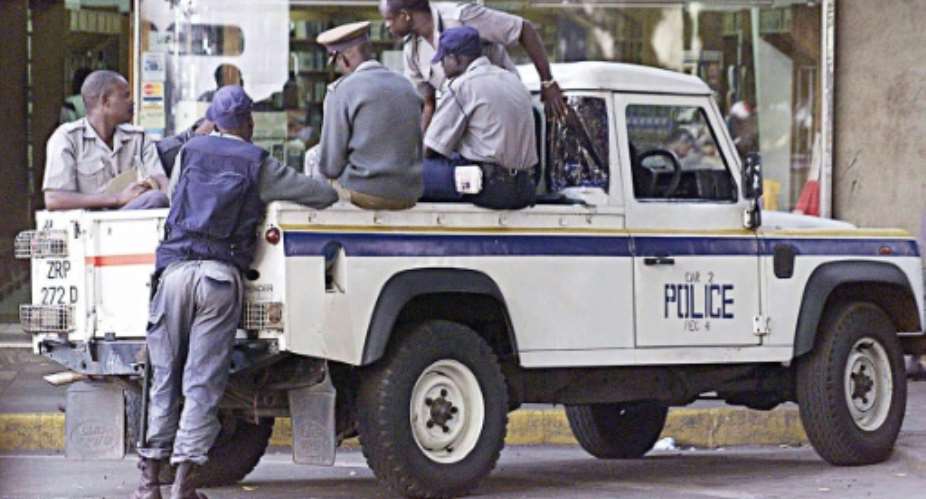 Zimbabwean police on patrol in Harare.  By DESMOND KWANDE AFPFile