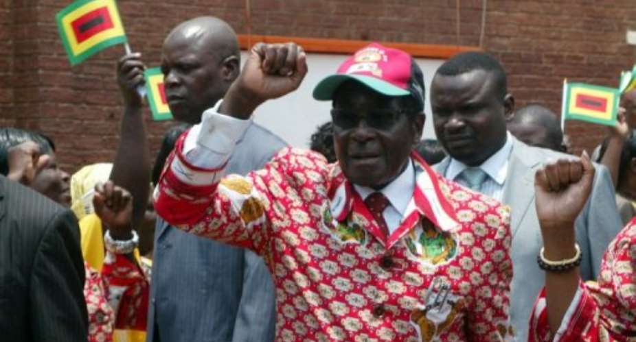 Zimbabwe President Robert Mugabe told his ZANU-PF supporters he would seek re-election in 2012.  By Jekesai Njikizana AFP