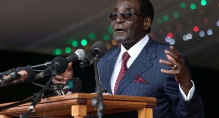 Zimbabwe's President Robert Mugabe delivers a speech during celebrations marking his birthday in February 2016.  By Jekesai Njikizana AFPFile