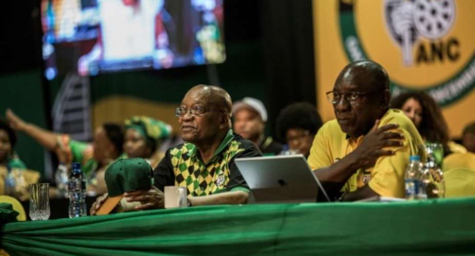 Zuma left and Ramaphosa pictured at last month's ANC congress, where Ramaphosa replaced his boss as party chief.  By GULSHAN KHAN AFP