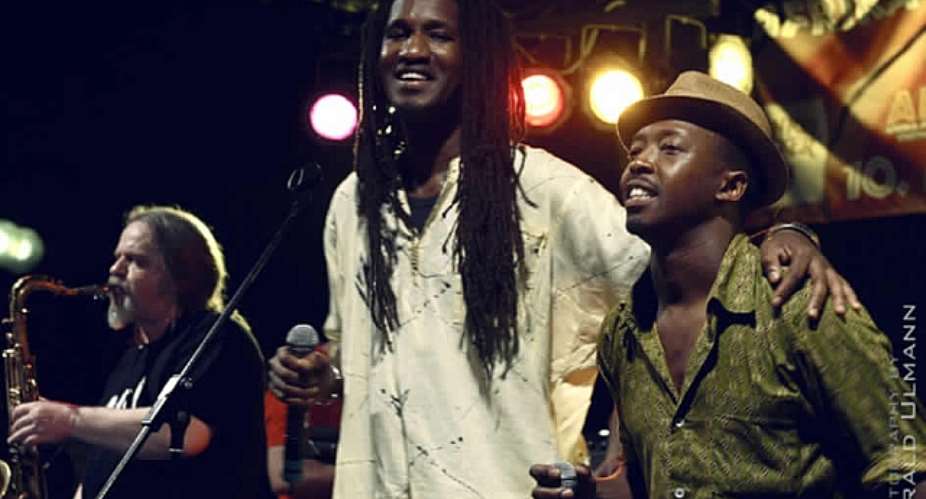 Louis Jean and Mthunzi  Fesileft giving tributes to the deceased South African Artist Lucky Dube by the 10th African Festival in Stuttgart this year.