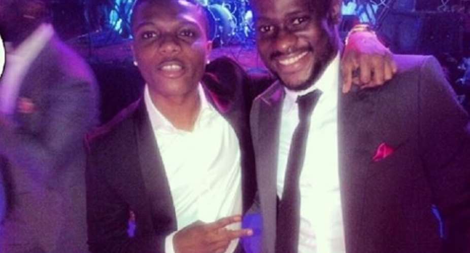 Wizkid and manager Godwin Tom part ways