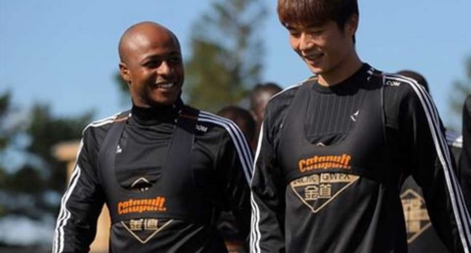 Andre Ayew and a teammate sharing jokes ahead of Friday8217;s training