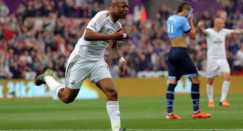 Andre Ayew celebrates following goal against Tottenham Hotspur