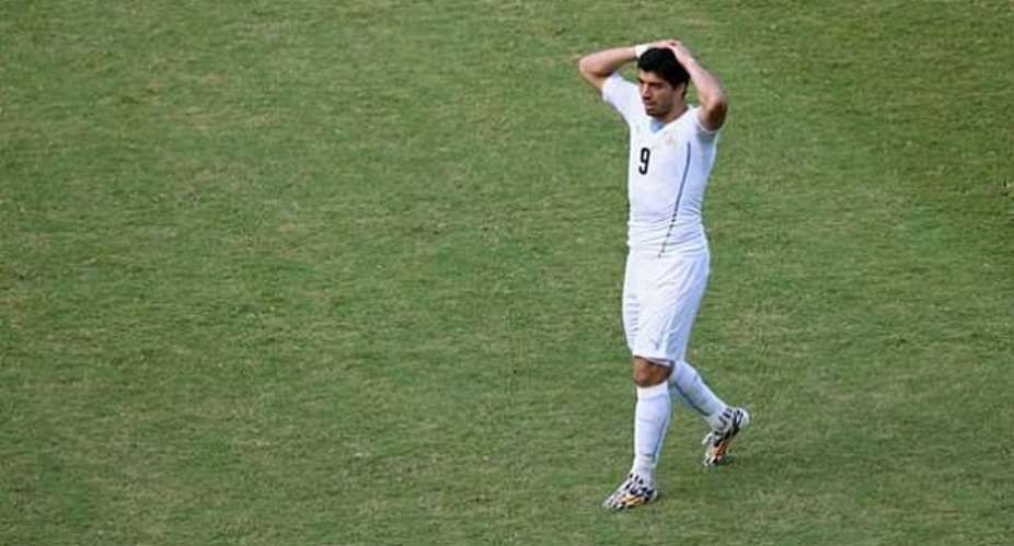 BANNED! Luiz Suarez suspended for 9 matches and 4 months