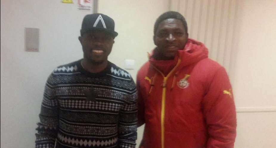 Kwadwo Asamoah and assistant coach Maxwell Konadu