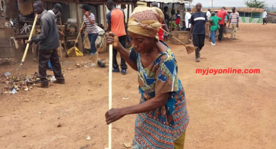 Photo of the week: The 70-year old woman who cleaned while the young sat on social media