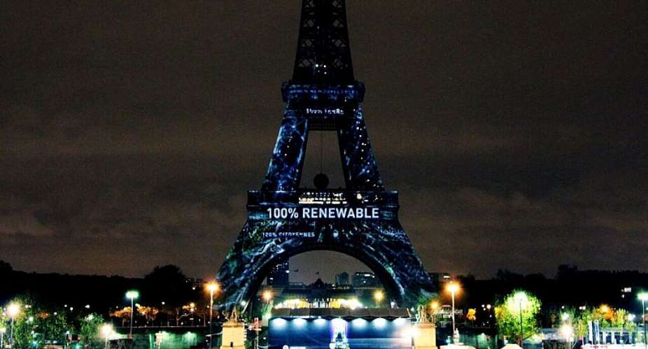 Eiffel Tower lights up with messages of hope on eve of COP21 Climate Conference