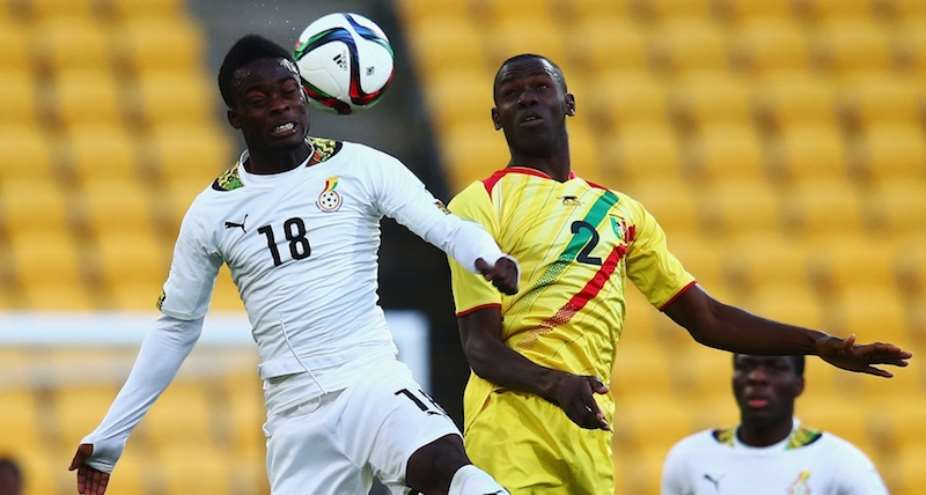 Barnes Osei L of Ghana jumps for a header with Mohamed Diallo of Mali during the FIFA U-20 World Cup New Zealand 2015 Round of 16 match between Ghana and Mali at Wellington Regional Stadium on June 10, 2015 in Wellington, New Zealand.