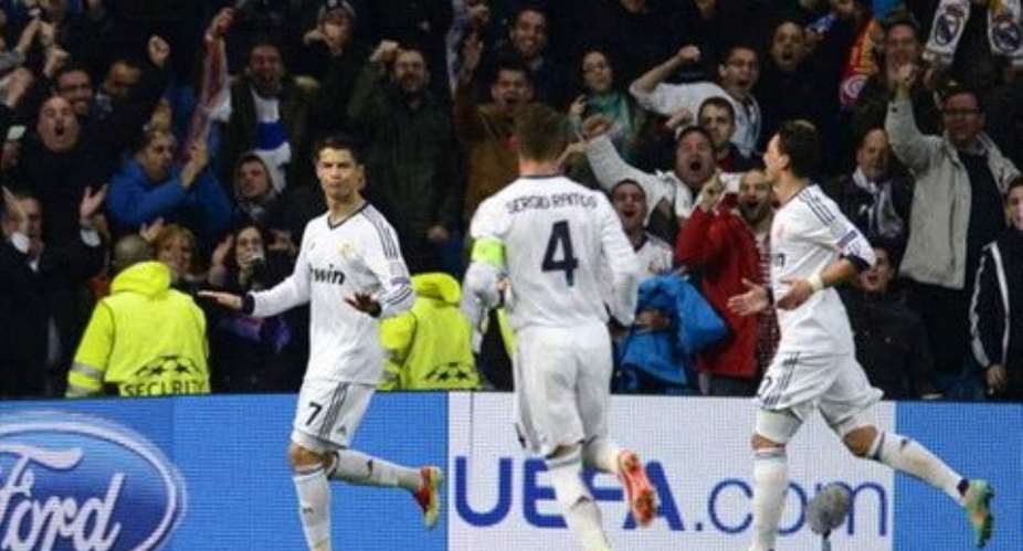 Ruthless Madrid put semis in sight
