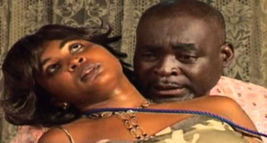 A scene from a movie which starred the late Suzzy Williams and Kofi Adjorlolo