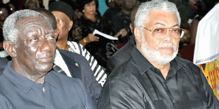Presidents J.A Kufuor and J.J Rawlingsseated together at the funeral service for thelate business tycoon, B.A Mensah yesterday