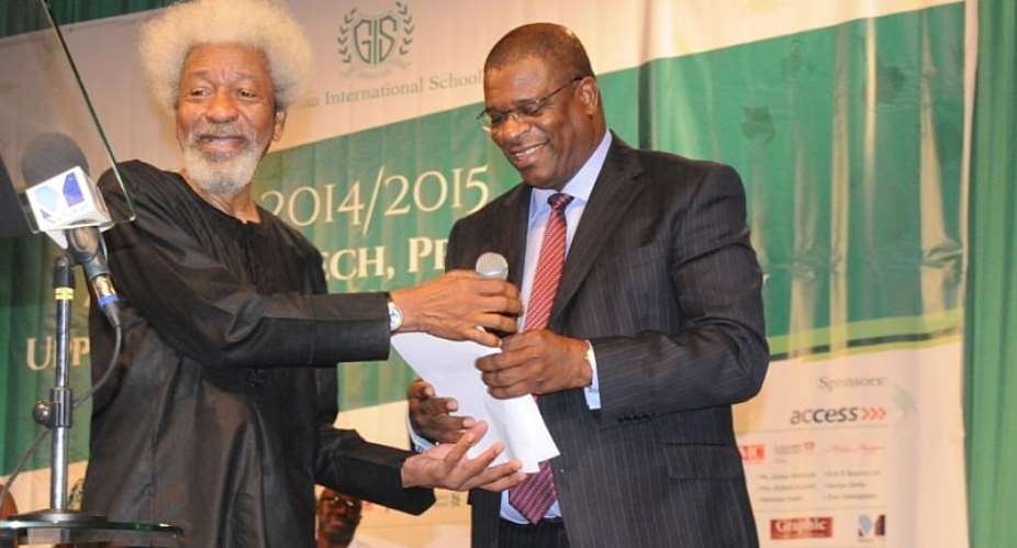Dolapo Handing Over The Microphone To Prof. Wole Soyinka To Deliver His Speech