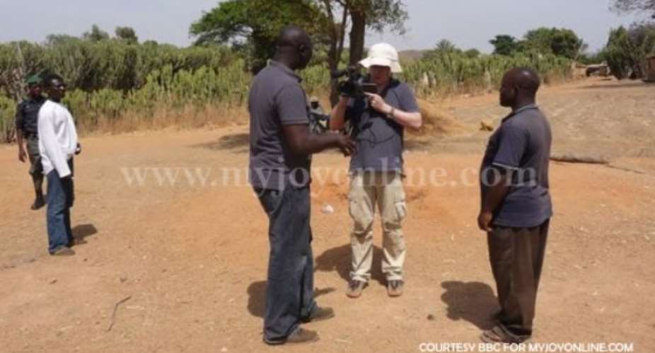 Komla Dumor with his production team in Jos, Nigeria