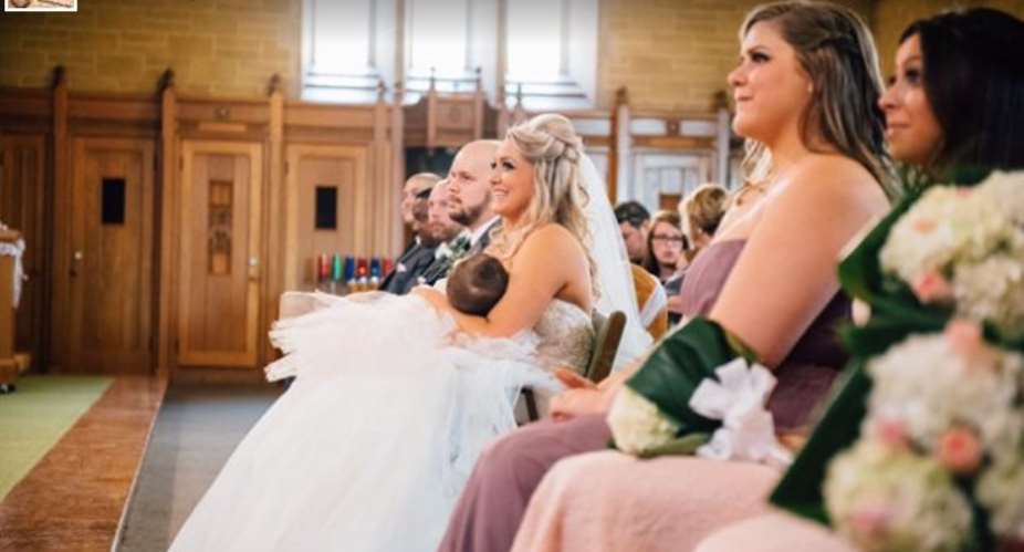 Mother breastfeeds baby in the middle of her wedding ceremony