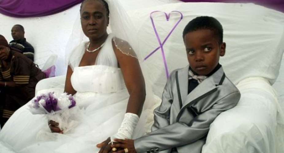 Unbelievable!!! 8 Year-Old Boy Marries 61 Year-Old Woman PICTURES