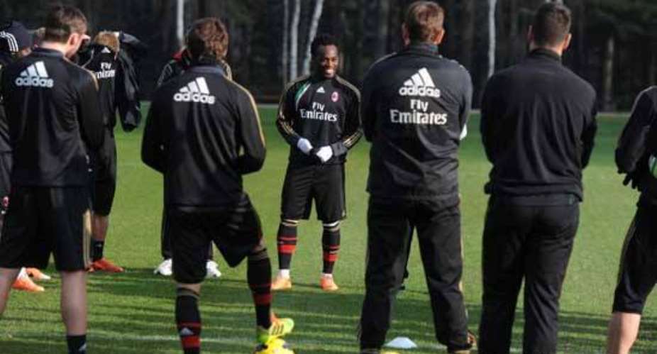 Essien with his new team-mates at Milan training
