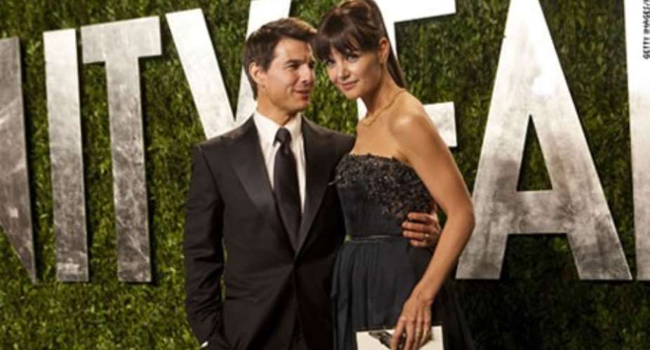 Katie Holmes and Tom Cruise (L) arrive at the Vanity Fair Oscar Party in February 2012