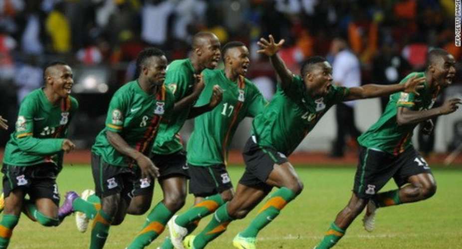 Zambia's players celebrate after their winning penalty in the shoot out against Ivory Coast.