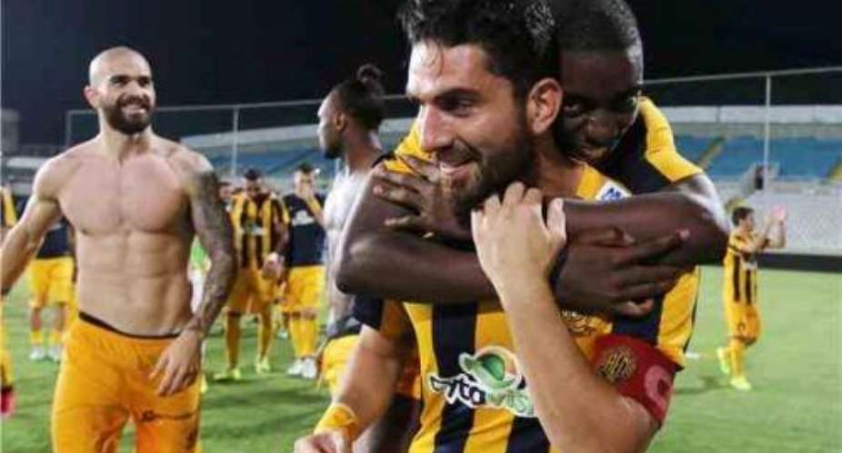 Ghanaian midfielder Carlos Ohene celebrates with his team-mate