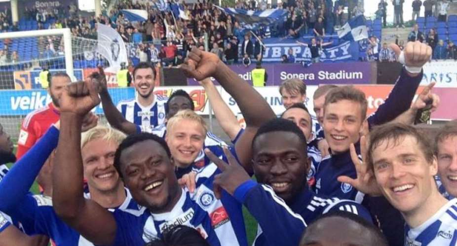 Gideon Baah joins his team-mates to celebrate after a big win