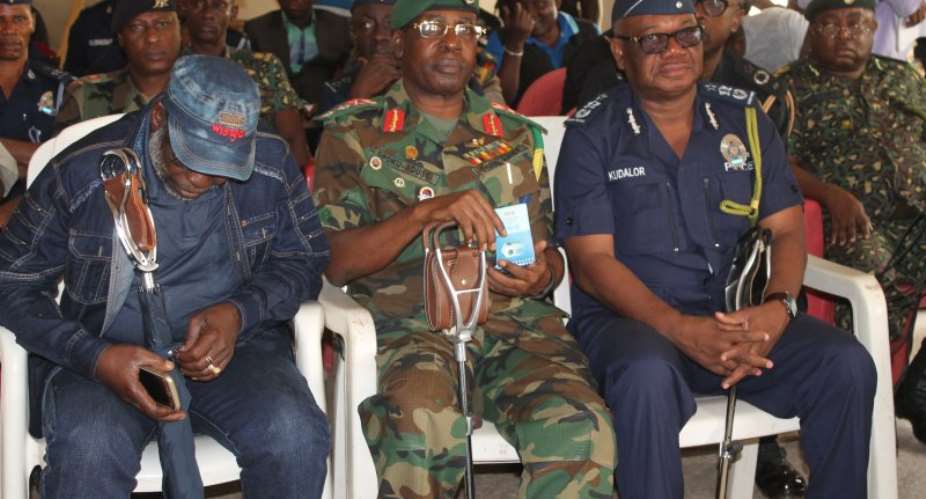 IGP far right with Chief of Army Staff middle and another security official in a meeting at Agogo