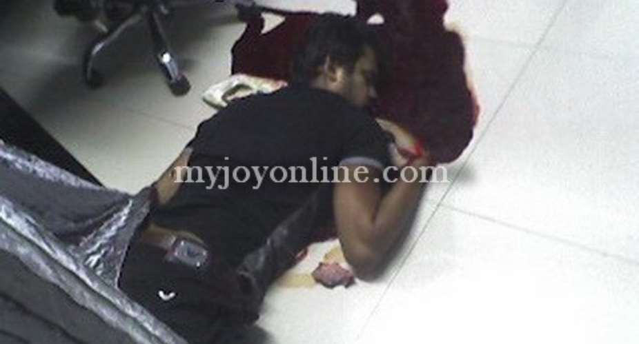 Sandip Mansukbai Sheladiya lying in a pool of blood