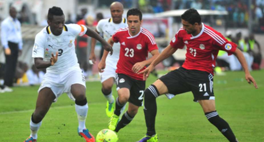 Asamoah Gyan in action for Ghana against Egypt.
