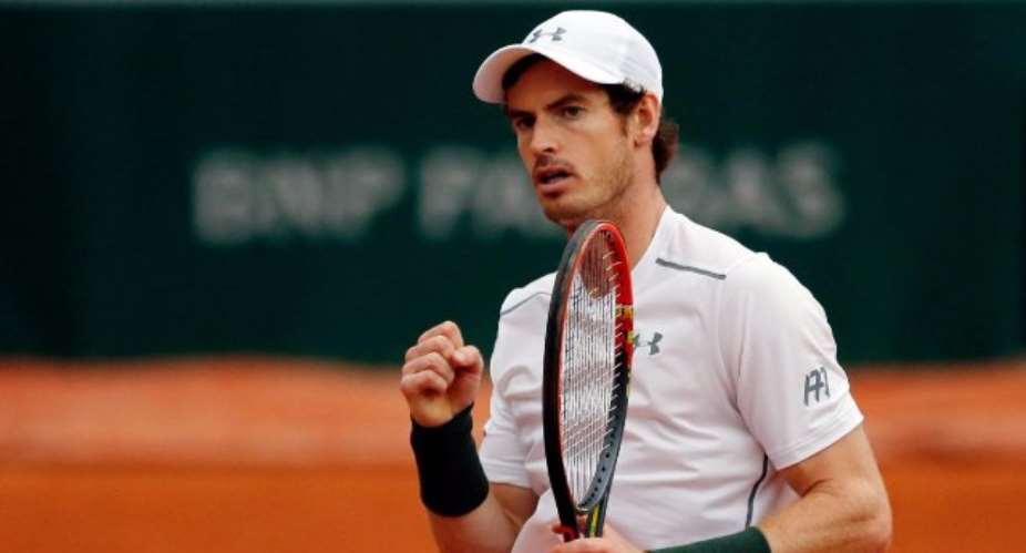 Andy Murray overcomes John Isner to reach French Open quarter-finals