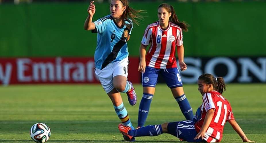 Spain ease past Paraguay into quarters