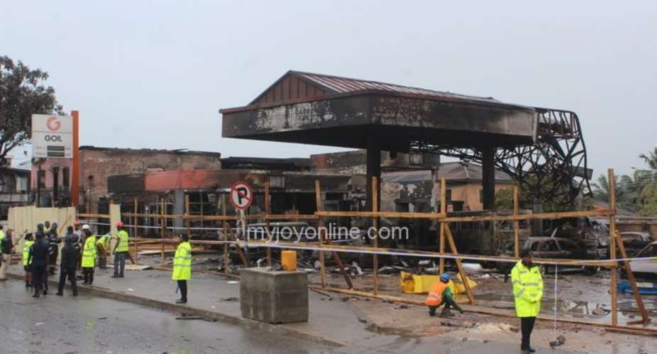 June 3 disaster committee tours tattered Goil Filling Station