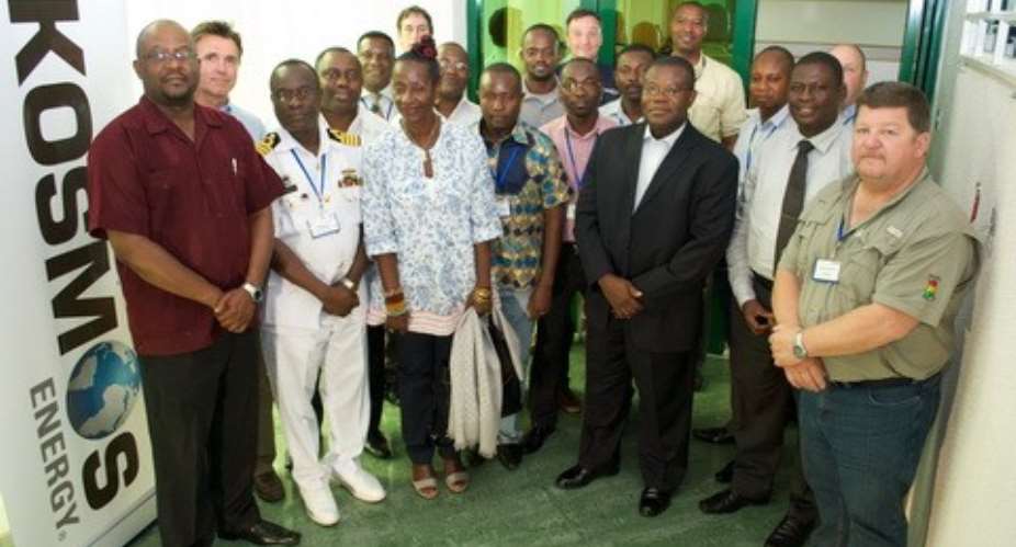 Some of the participants and facilitators in a group photograph with Madam Sherry Ayittey, Minister of Environment, Science, and Technology.