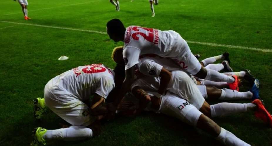 Inkoom, top, celebrates a goal with his Antalyaspor team-mates