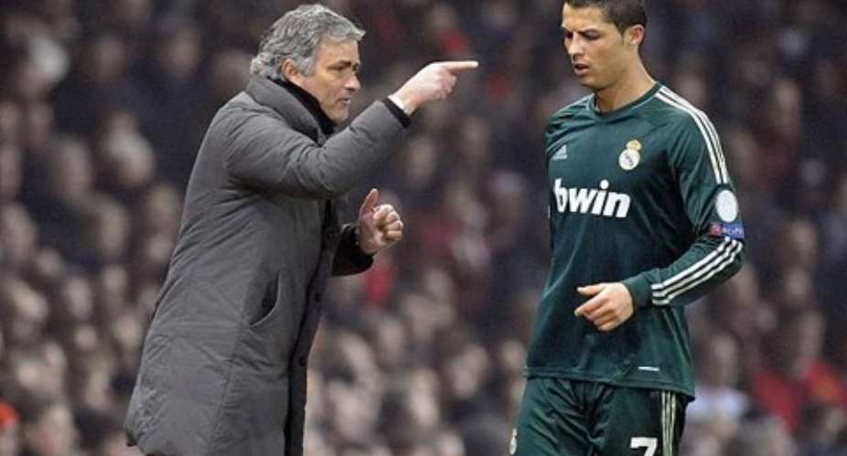 LISTEN UP ... Mourinho talks tactics but Ronaldo is not interested