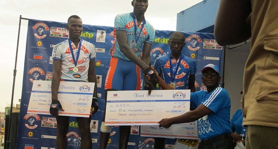 Emmanuel Sackey (Middle) Receiving His Prize