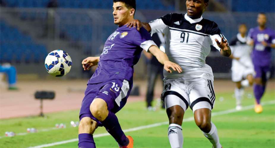 John Antwi, right hassling for the ball with Al Ain8217;s Mohanad Salem, could join Al Ahly